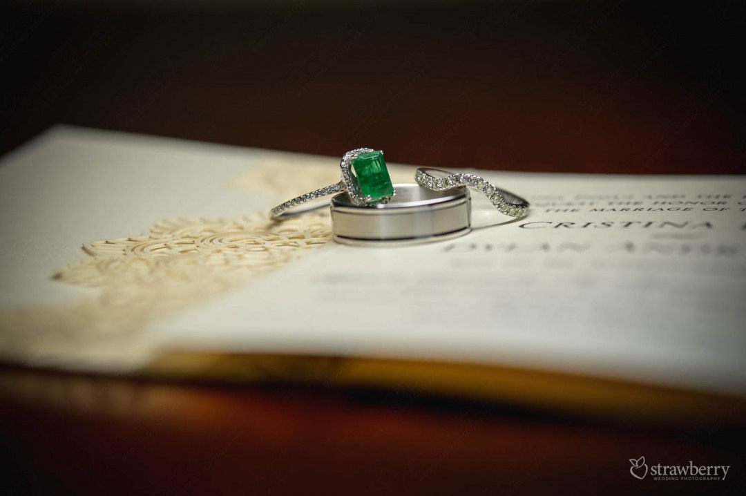 emerald-wedding-ring-on-book