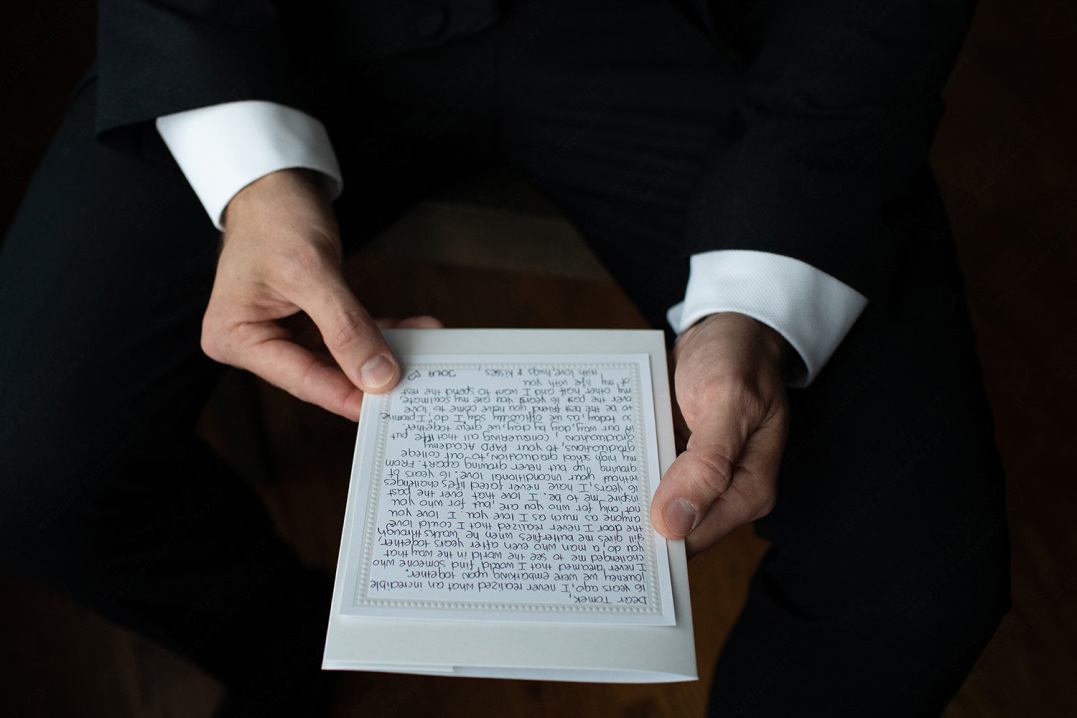 12-groom-reading-wedding-letter