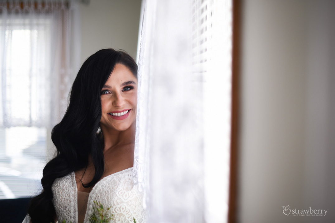 beautiful-bride-near-by-window