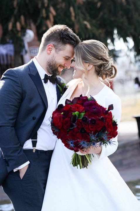 20-bride-groom-forehead-touch-red-roses-wedding-bouquet