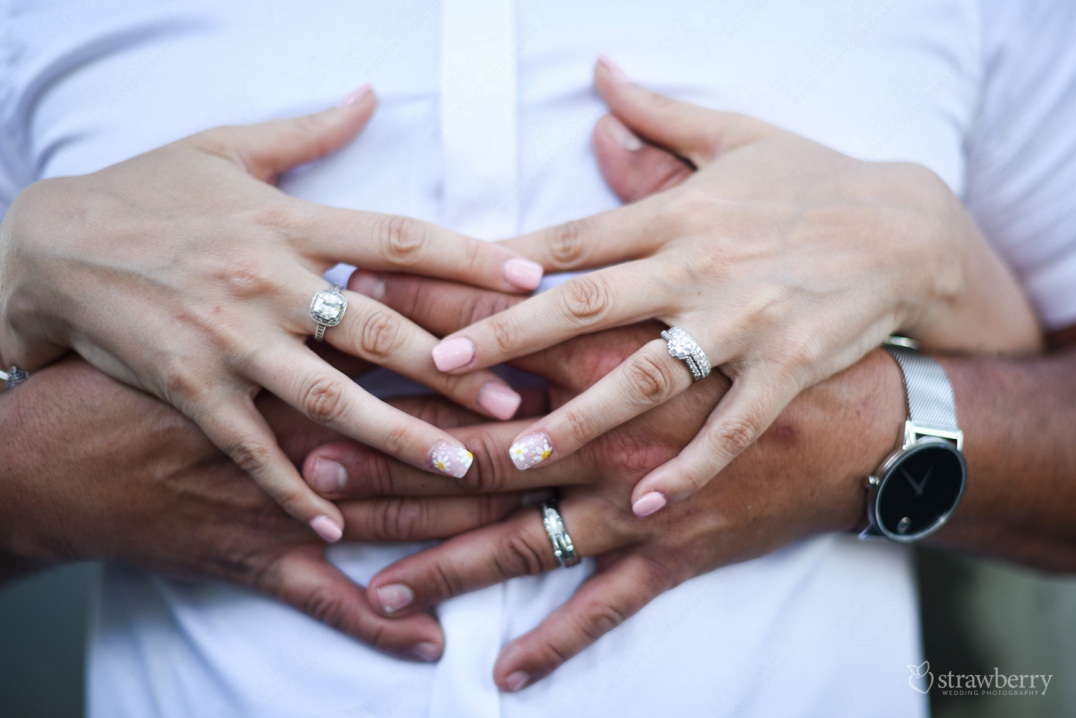 engaged-couple-holding-hands-closeup