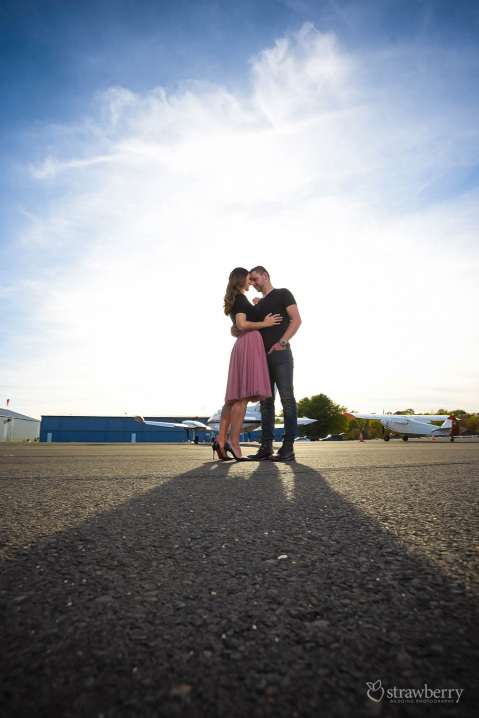 couple-hugging-on-airstrip
